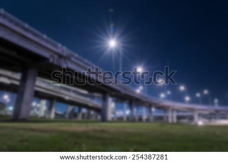 tollway express road with grass lawn in night scene