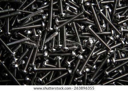 texture background of custom hex head bolt screw thread on tray with any light direction in studio