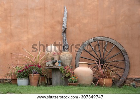 beautiful decorative garden with outdoor furniture under sunlight in evenning