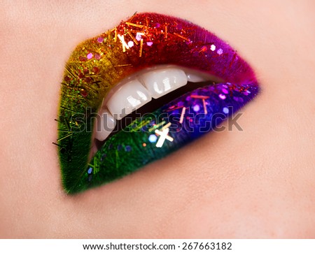 Halloween makeup. Expression rock style lip make-up like a vampire, dark romantic. Fashion look, glitter, multicolor, soft focus