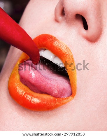 makeup. Expression rock style lip make-up like a vampire, dark romantic. Fashion look, glitter, multicolor, soft focus