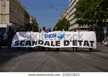 Marseille, France - June 26, 2014: Employees of the Societe nationale Corse Mediterranee (SNCM) denounce government\'s reforms and austerity politics.