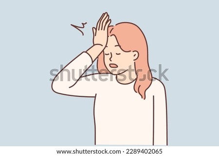 Woman makes gesture with facepalm putting palm to forehead, having learned about mistake made, which entails loss money. Girl demonstrates facepalm upset after bad news or quarrel with boyfriend
