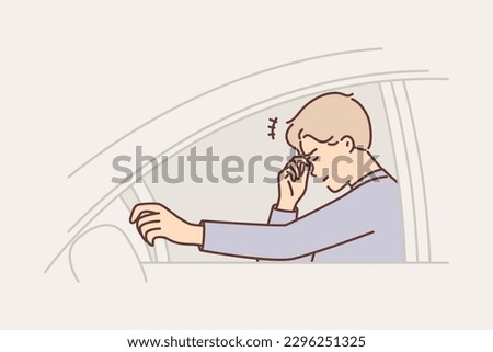 Man car driver feels exhausted or anxious due to work overload and financial problems. Guy driver suffers from migraine and headache while driving car or is nervous getting stuck in traffic jam