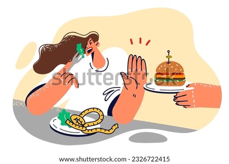 Woman refuses hamburger and eats healthy food, wanting to get rid of excess weight and lead healthy lifestyle. Girl with plate filled with salad makes stop gesture refusing to eat fast food