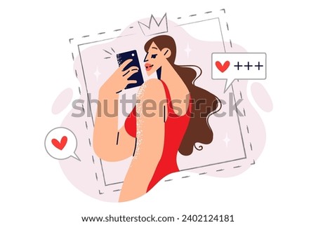 Woman beauty blogger takes selfie with phone camera to show off purchase of new dress to subscribers. Girl influencer making selfie on smartphone, wanting to get lot of likes and positive feedback.