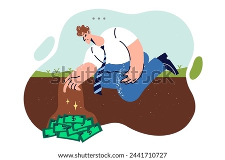 Man digs money out of ground after finding valuable cache of cash during random walk. Guy is burying money due to lack of trust in banks and investments or other financial institutions