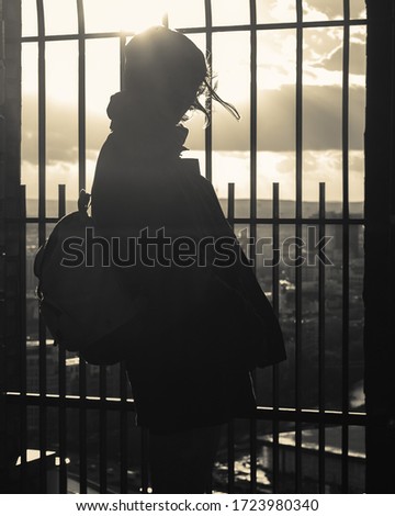 2018, a Woman stands at Panoramapunkt Berlin Potsdamer Platz. She is Looking above Berlin. 
We´ve got a Sneak piek of Berlin while sunset Zdjęcia stock © 