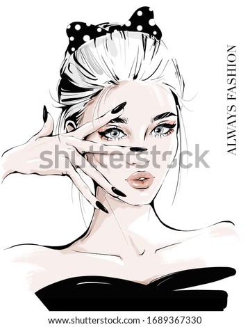 Hand drawn young woman with hand near face. Fashion girl with spotted black bow in her hair. Stylish woman. Sketch. Fashion illustration.