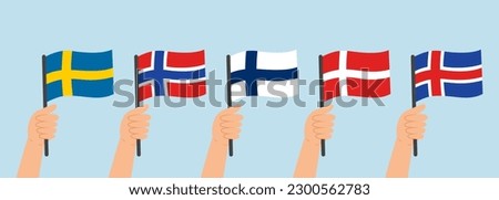 Hands holding flags of Scandinavian countries (Sweden, Norway, Finland, Denmark, Iceland). Vector illustration in flat style on blue background.