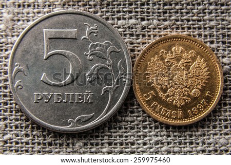 two coins of five rubles, gold nineteenth century and nickel twenty first eyelid