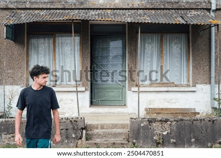 Similar – Image, Stock Photo Man shooting building facade with smartphone in downtown