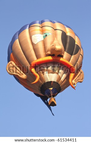 PLANO, TX - SEPTEMBER 18: A hot air balloon rises into the sky during the annual Plano Hot Air Balloon Festival on September 18, 2010 in Plano, Texas