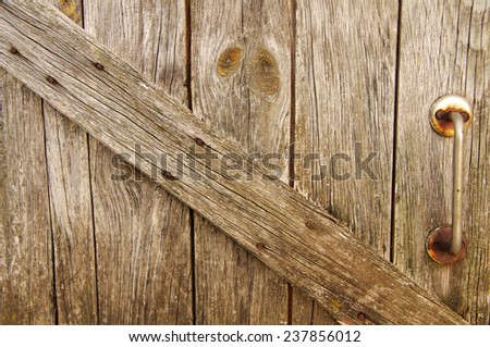 The old wooden cracked broken door
