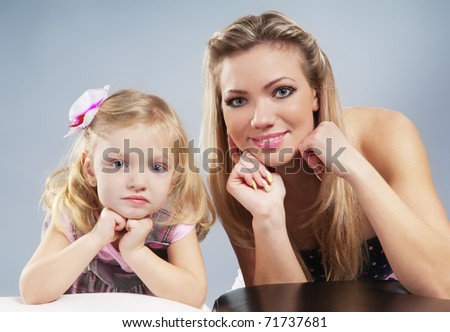 Beautiful young mum and her daughter