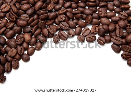 Coffee bean background with lot of white copy space for your edit.