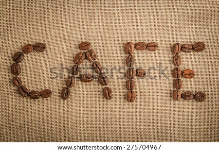 Roasted coffee beans making the word 