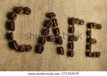 Roasted coffee beans making the word \