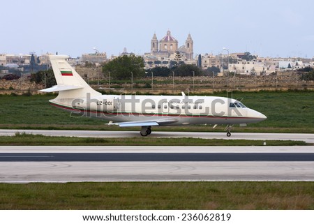 Luqa, Malta February 12, 2008: Bulgarian Air Force Dassault Falcon 2000 entering runway 31 for take off.