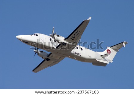 Luqa, Malta August 25, 2004: Air Express Algeria Beech 1900D climbs out of runway 32.