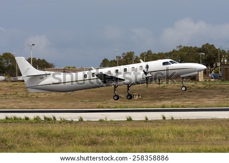 Luqa, Malta September 27, 2010: United States Navy Fairchild C-26D Metro 23 (SA-227DC) departing runway 13 after having participated in the Malta International Airshow 2010.