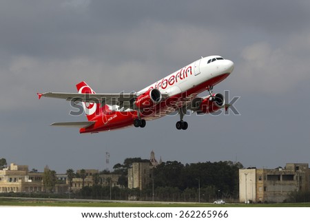 Luqa, Malta March 20, 2015: Air Berlin (Niki) Airbus A319-112 takes off from runway 13. A319 will be replacing the Embraer E190 in Niki\'s fleet, which should eventually end up in an all Airbus fleet.