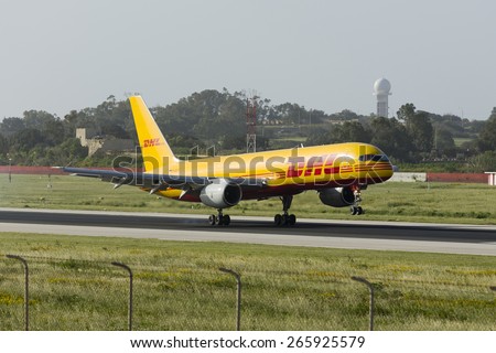 Luqa, Malta April 2, 2015: DHL (European Air Transport - EAT) Boeing 757-236(SF) arriving runway 31 in the morning.