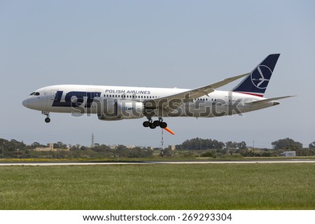Luqa, Malta - April 14, 2015: LOT - Polish Airlines Boeing 787-8 Dreamliner landing runway 31. This is the first time that a Dreamliner landed in Malta, with 2 landing within an hour.