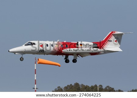 Luqa, Malta April 30, 2015: FAI - Flight Ambulance International Gates Learjet 35A landing runway 31.