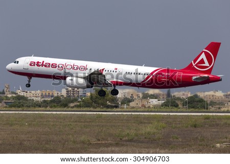 Luqa, Malta August 10, 2015: AtlasGlobal Airlines Airbus A321-231(TC-ETV) landing runway 31.