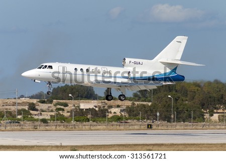 Luqa, Malta June 10, 2005: Aero Service Executives Dassault Falcon 50 landing runway 31.