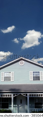 an image of a single blue house
