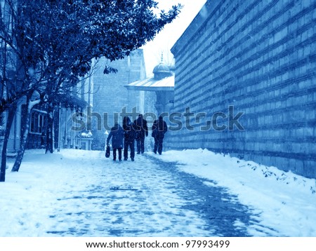 an image of the people walking in winter time