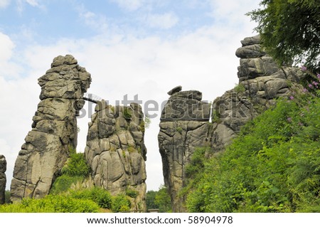 Externsteine near Detmold Germany is a Sandstone formation whose withered shapes have talked to the Mystic sides of Man ever since the Stone Ages. The Rocks have been the Scenery for Cultic Rites.
