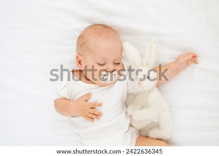 Similar – Image, Stock Photo Sweet newborn sleeping in soft bed at home