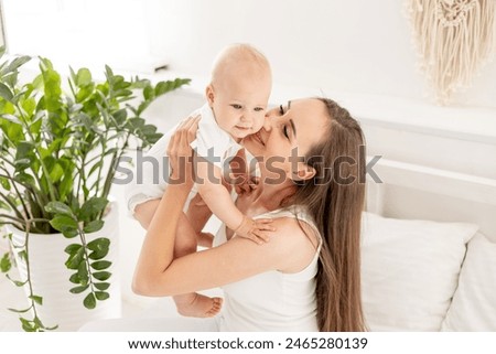 Similar – Image, Stock Photo Beautiful Mother And Baby outdoors. Mum and her Child together enjoying sunset