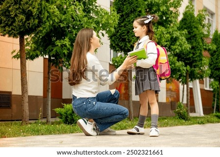 Similar – Image, Stock Photo Young mom walking with her baby during covid pandemic