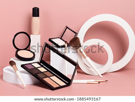 Make up products prsented on white podiums on pink pastel background. Mockup for branding and packaging presentation Stock foto © 