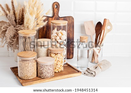 Similar – Image, Stock Photo Green pasta in plastic packing on dark kitchen table with kale and other ingredients. Top view