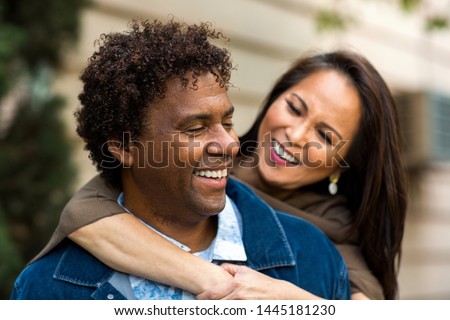 Similar – Image, Stock Photo Romantic loving diverse couple kissing in nature on sunny day