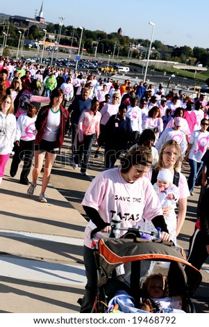 Nashville, TN - October 25: Thousands of people walk to support breast cancer research in Nashville, TN on October 25.  40,954 women and 362 men died from breast cancer in the United States in 2004.