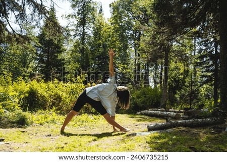 Similar – Image, Stock Photo Girl who practices yoga at home. Concept of health.