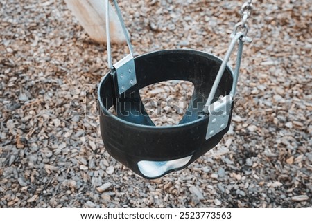 Similar – Image, Stock Photo black chain Tire Swing at a children’s  play ground no people