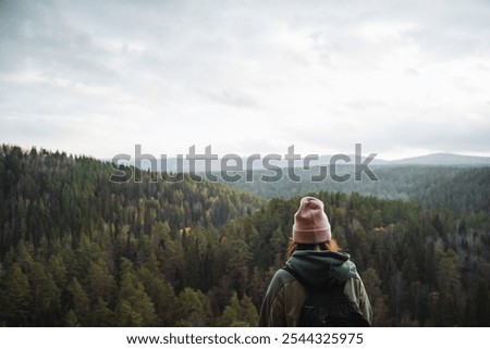 Similar – Image, Stock Photo Tourists gazing at breathtaking snowy mountain slope