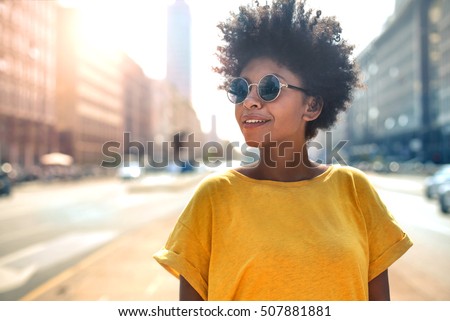 Similar – Image, Stock Photo Cool black woman with Afro braids on street in sunshine