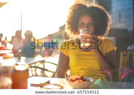 Similar – Image, Stock Photo Black woman enjoying fries and burger in restaurant