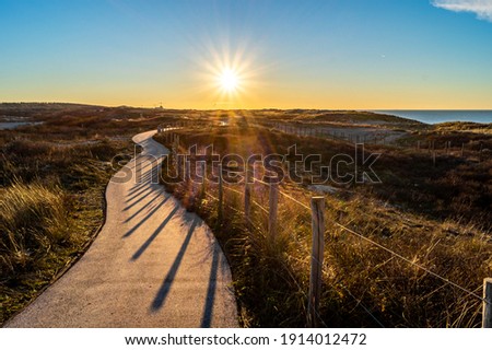 Similar – Image, Stock Photo Path through the dunes with a view of the beach of the North Sea