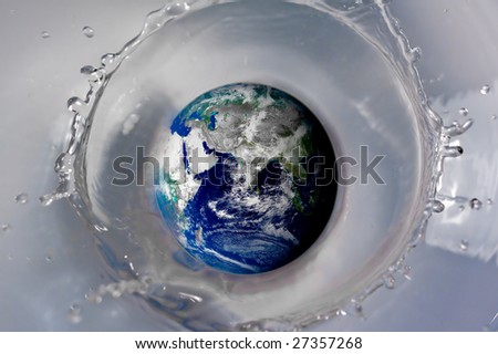 The world being dropped in water (the earth falling, a good concept for global warming etc.)