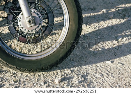Motorbike wheel on the road