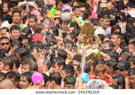 On Songkran day there are many traditional activities as well. Here, Buddhist devotees pour water on statues, one of Nong Khai,Thailand most revered statues.Taken on April 13,2014 in Thailand
